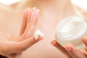 Skincare. Woman taking care of her dry complexion.